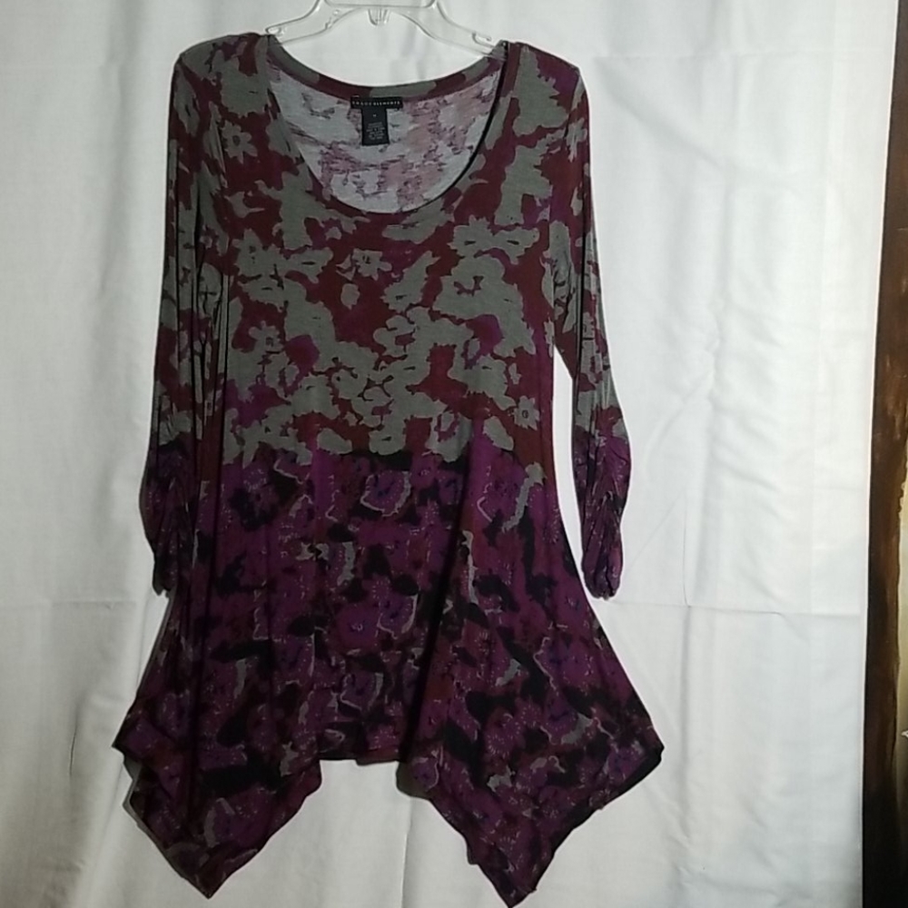 Multi use tunic top three quarter sleeves.
